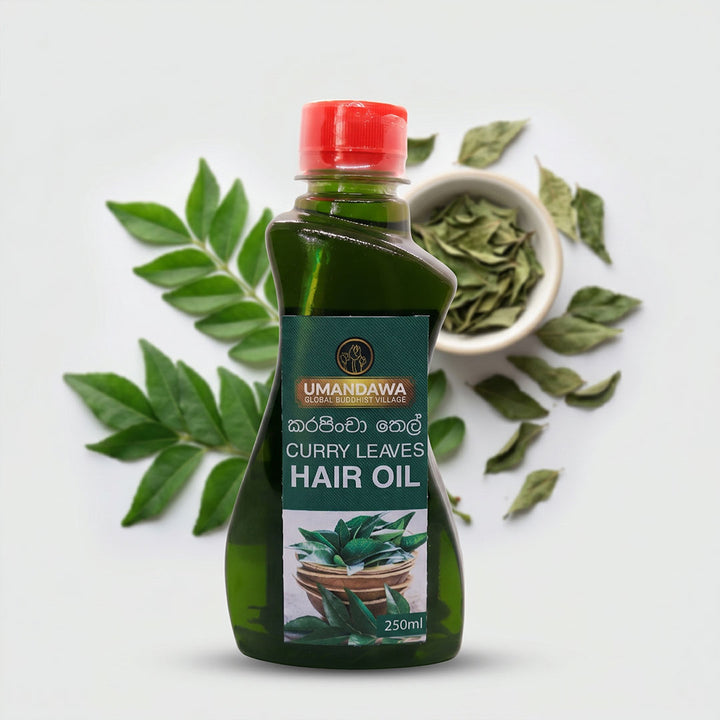 Curry leaves hair oil bottle with fresh and dried curry leaves on a white background